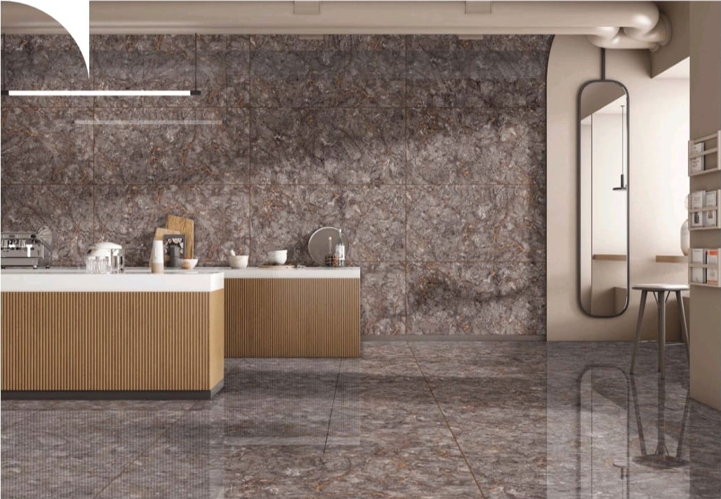 Large format grey porcelain floor tiles in a modern hallway